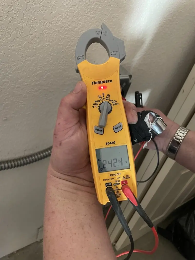 Voltage testing with clamp meter during Generator Installation in Piedmont